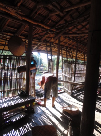 Winnowing rice. Ensaid Panjang Longhouse, Sintang, West Kalimantan