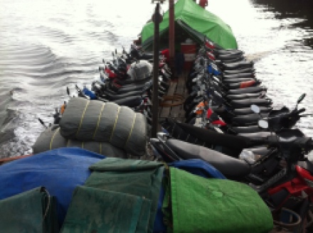 Top of the boat, laden with bikes, gas canisters and drums Somewhere between Sukadana and Pontianak, West Kalimantan
