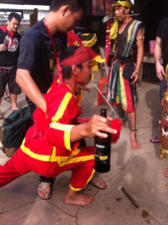 Trance..via a bottle of Guinness Cap Go Meh Festival, Singkawang, West Kalimantan